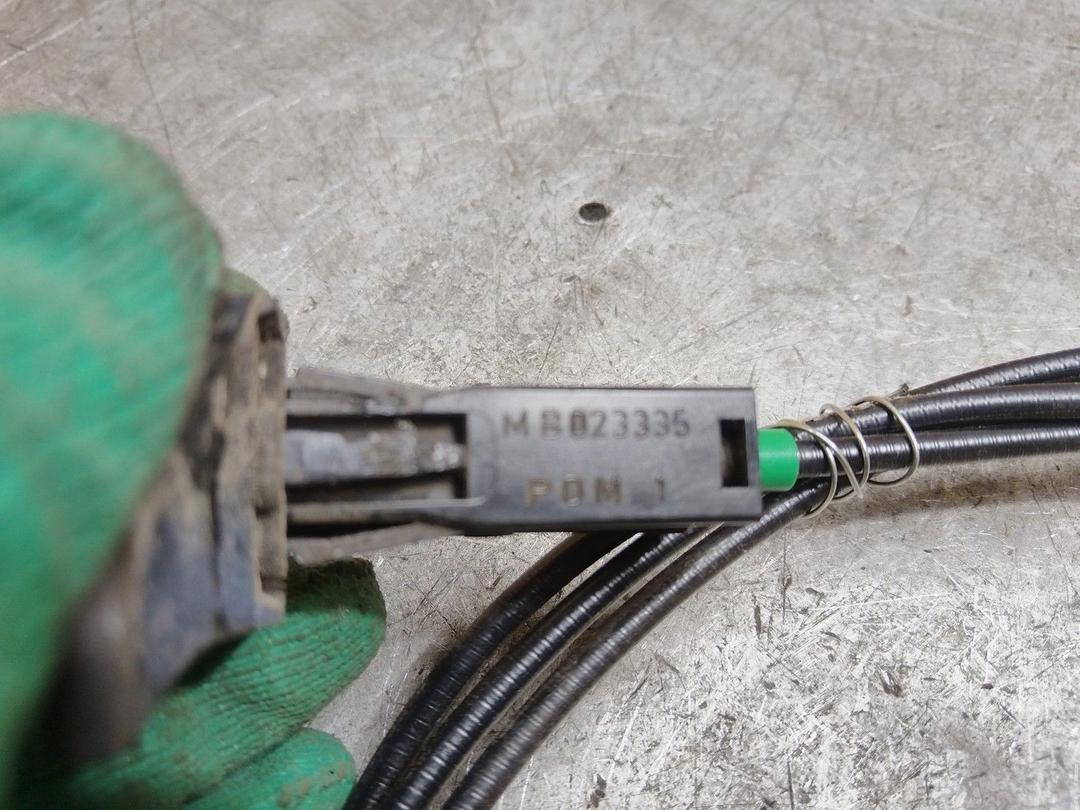 Трос открывания лючка топливного бака YZMPRW Mitsubishi Carisma купить в магазине запчастей бу