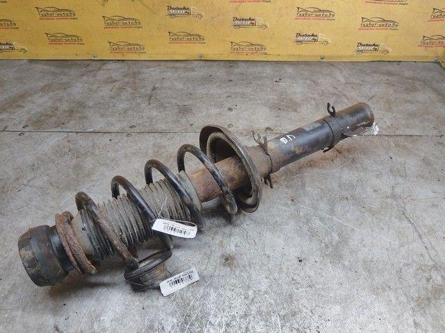 Амортизатор передний левый YJ8WC9 Audi A3