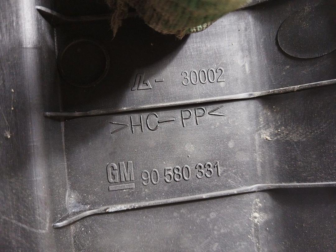 Накладка замка багажника 0LR7RW Opel Zafira купить в магазине запчастей бу