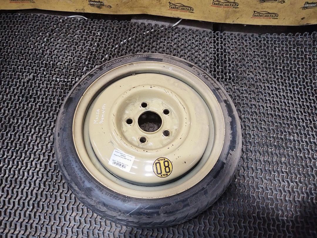 Колесо запасное (таблетка) ZGN0VC Mazda Premacy