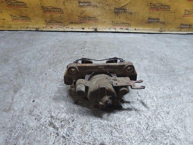 Суппорт передний левый 7066BH Renault Laguna купить в магазине запчастей бу