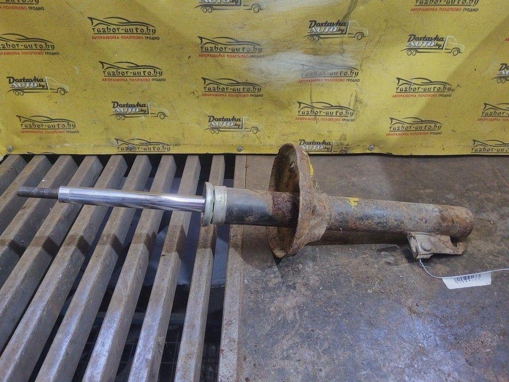 Амортизатор передний левый 83HI42 Ford Fiesta - Фото 1