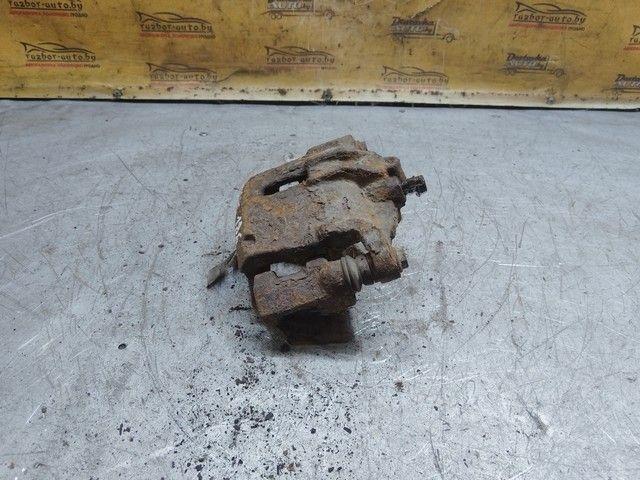 Суппорт передний левый 615NQ3 Toyota Yaris