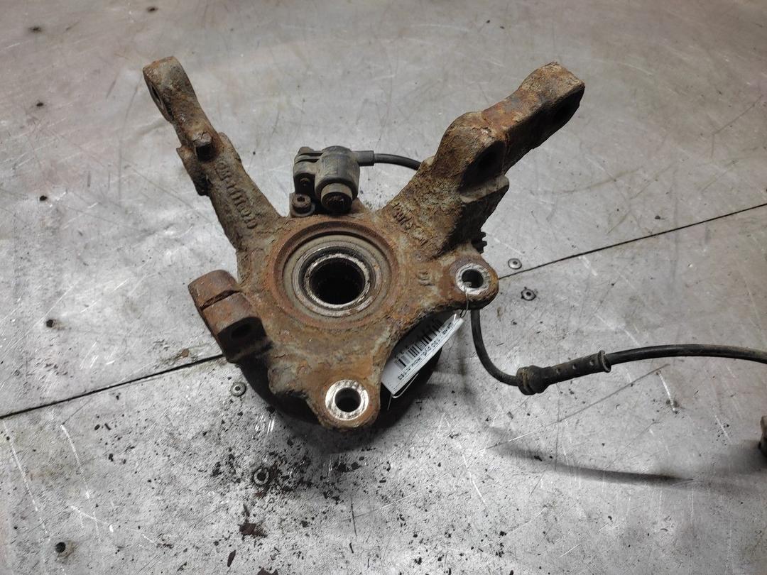 Кулак поворотный левый 1BGLEO Opel Meriva