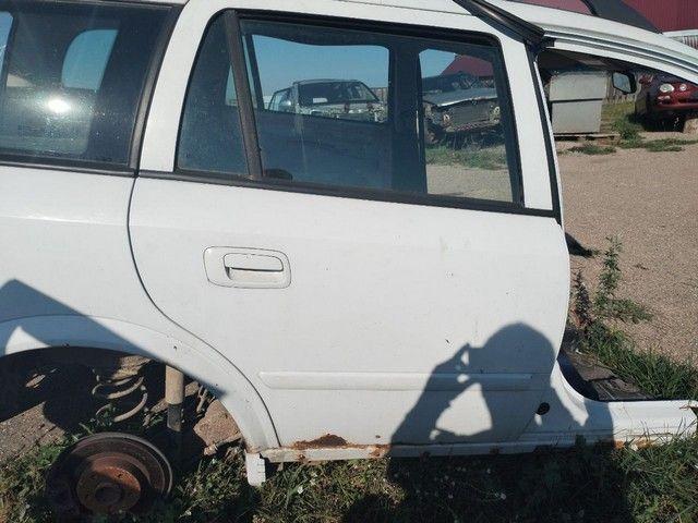 Замок двери задней правой 0415HX Opel Astra