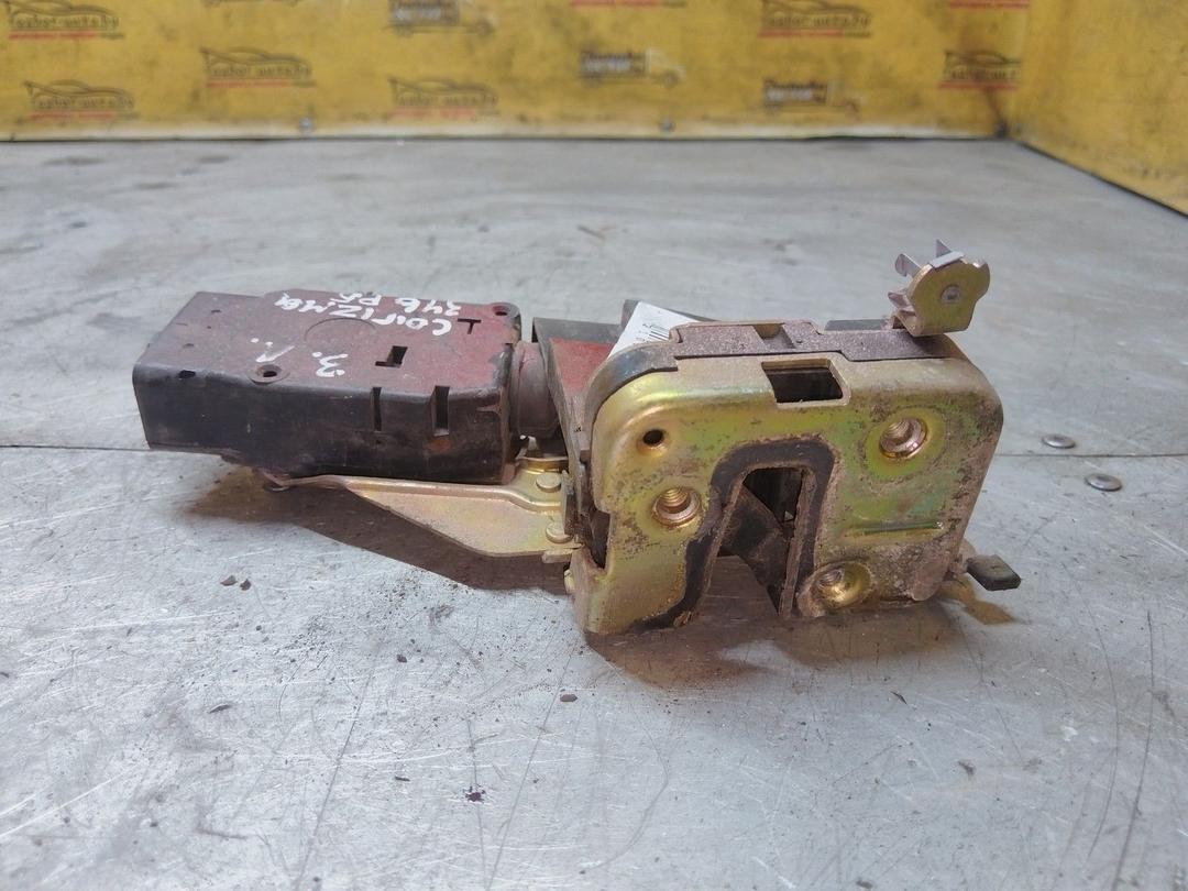 Замок двери задней левой J9G890 Mitsubishi Carisma - Фото 1