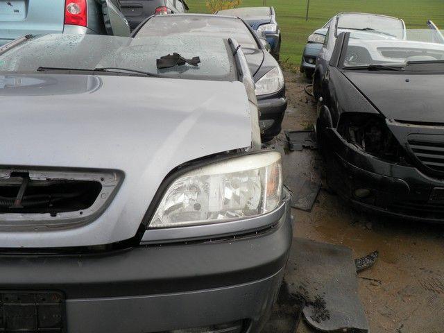 Ус под фару левый CO31JE Opel Zafira - Фото 1