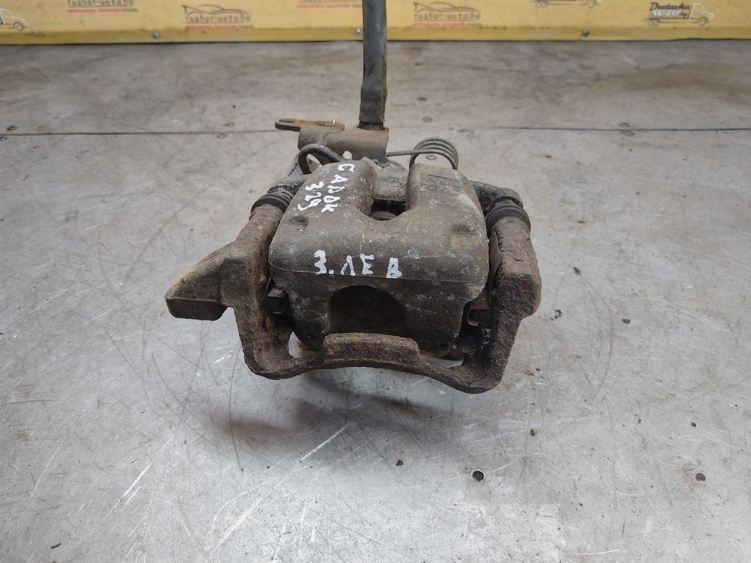 Суппорт задний левый Z9MVWU Volkswagen Caddy