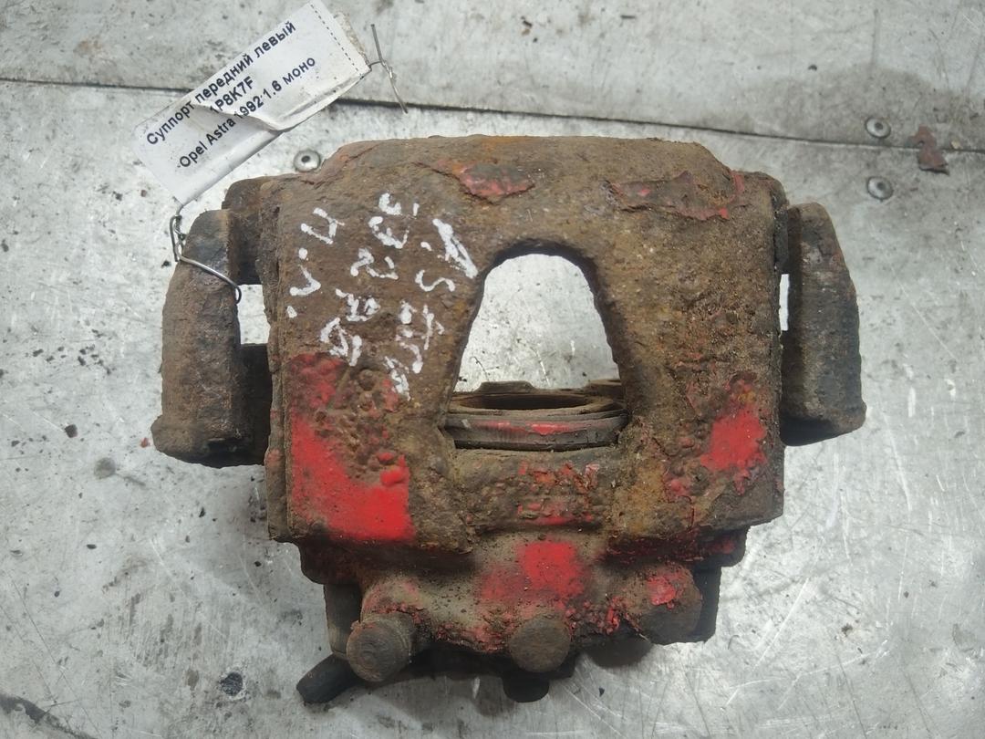 Суппорт передний левый 1P8K7F Opel Astra