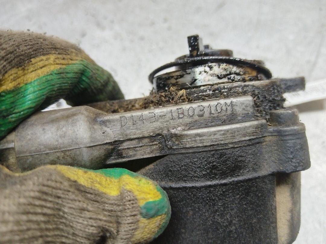 Насос вакуумный Q664MG Peugeot Partner купить в магазине запчастей бу