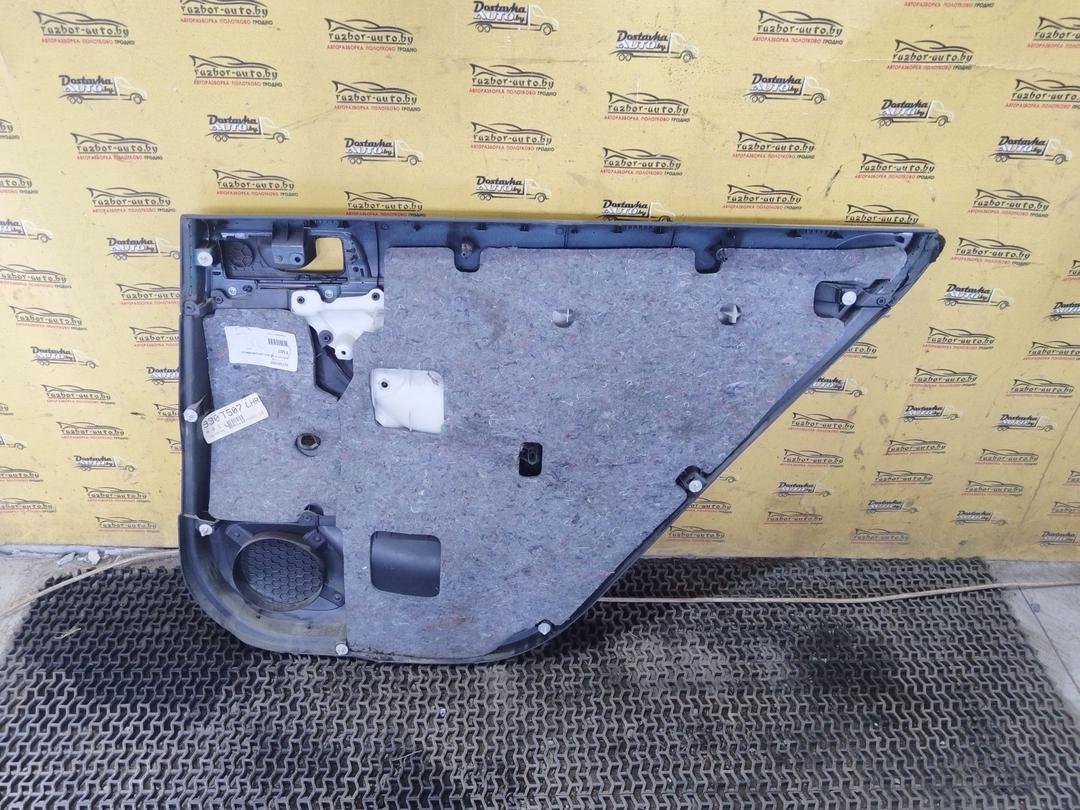 Обшивка двери задней левой (дверная карта) S98NUU Toyota Avensis купить на авторазборке