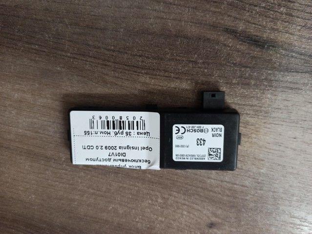 Блок управления бесключевым доступом DI01V7 Opel Insignia