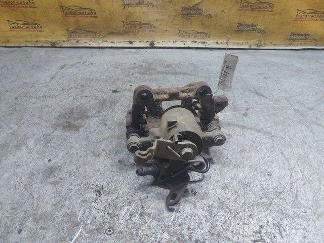 Суппорт задний правый T48DML Volkswagen Jetta купить на авторазборке