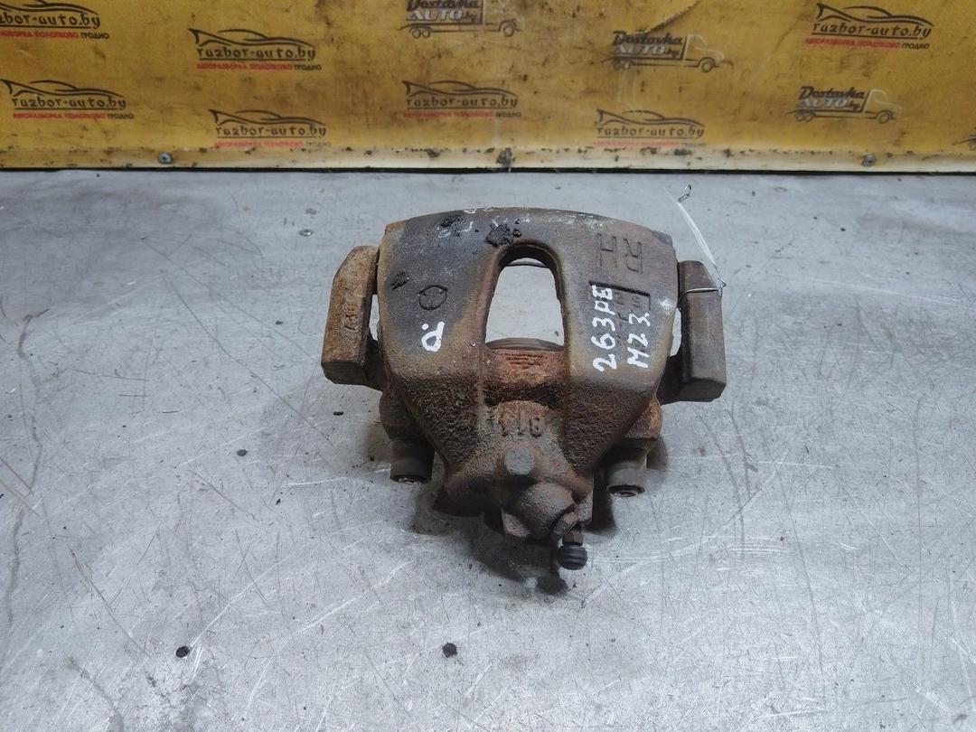 Суппорт передний правый TXFLL8 Mazda 3