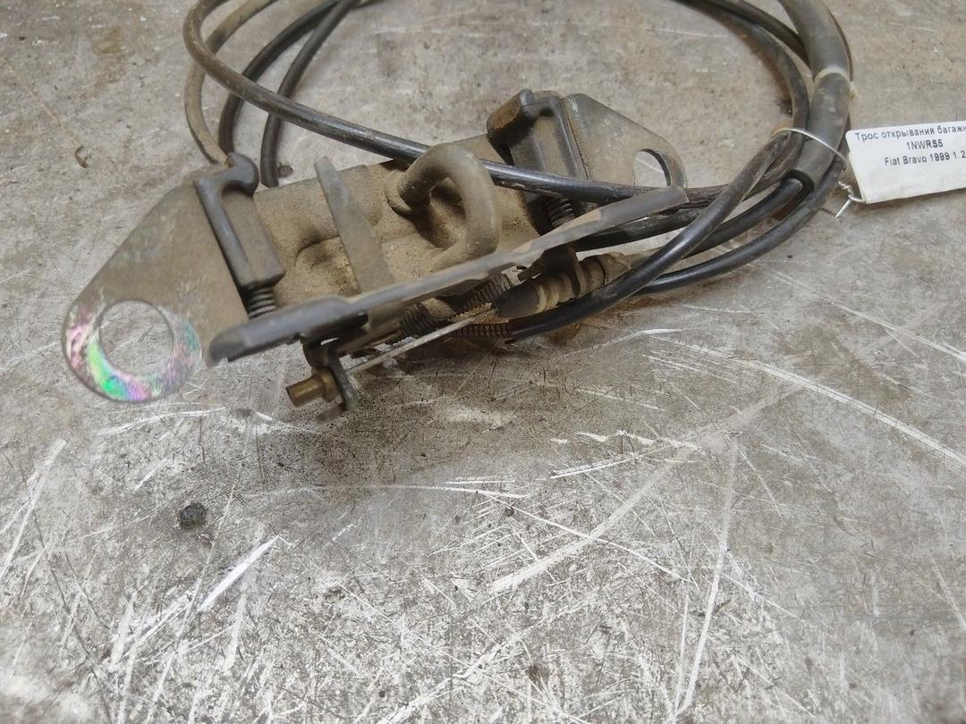 Трос открывания багажника 1NWRS5 Fiat Bravo купить в магазине запчастей бу