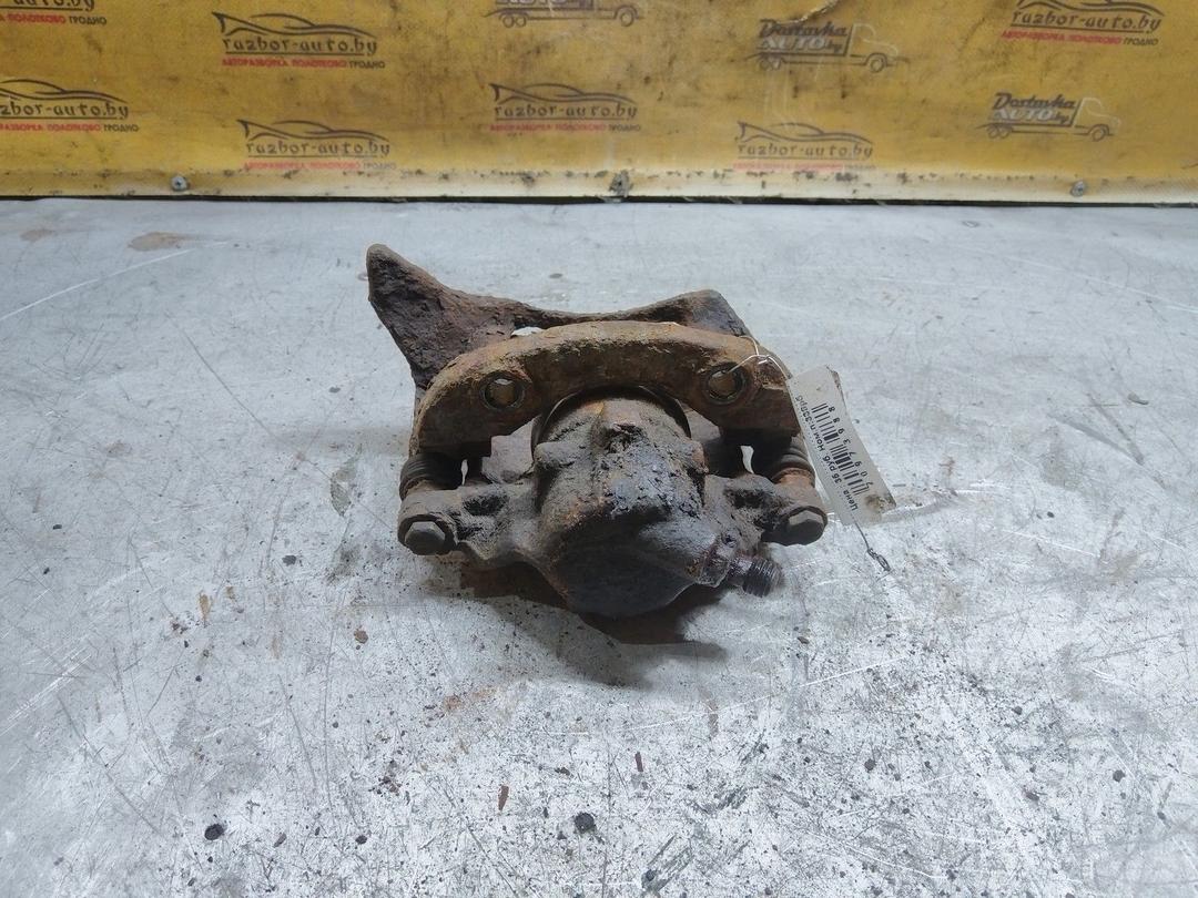 Суппорт передний левый 9IG084 Peugeot 405 купить в магазине запчастей бу