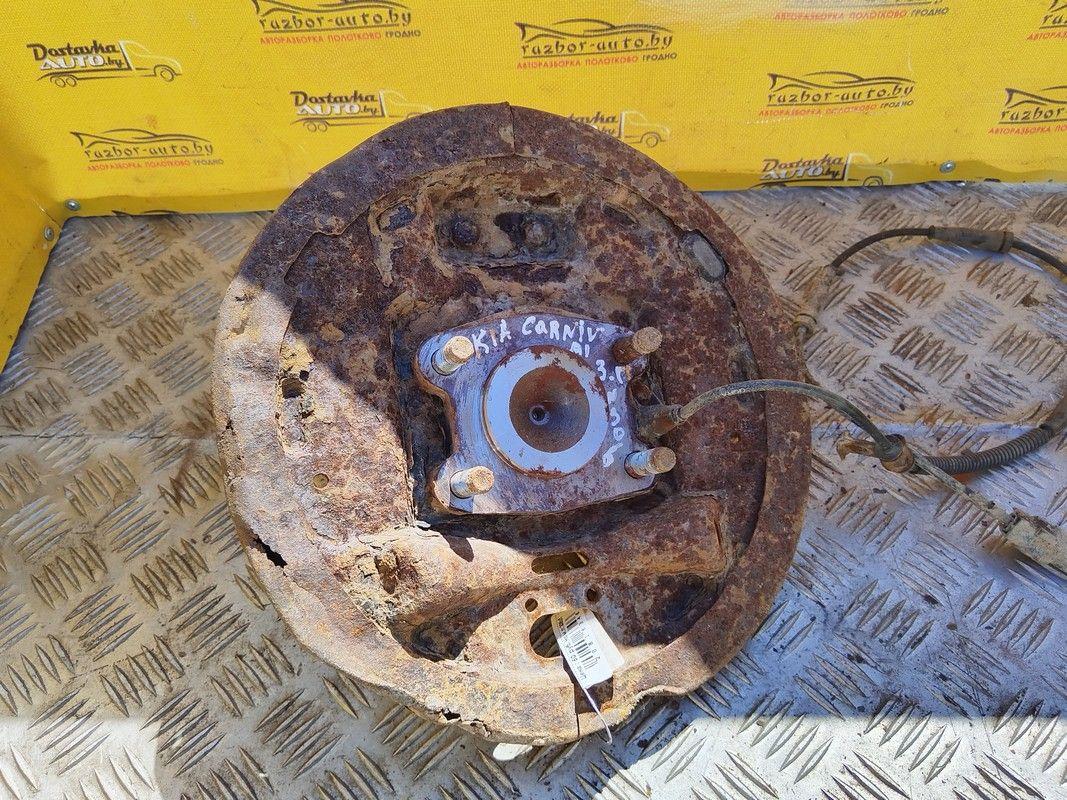 Цапфа задняя (ось ступицы) 4VBTMB Kia Carnival - Фото 1