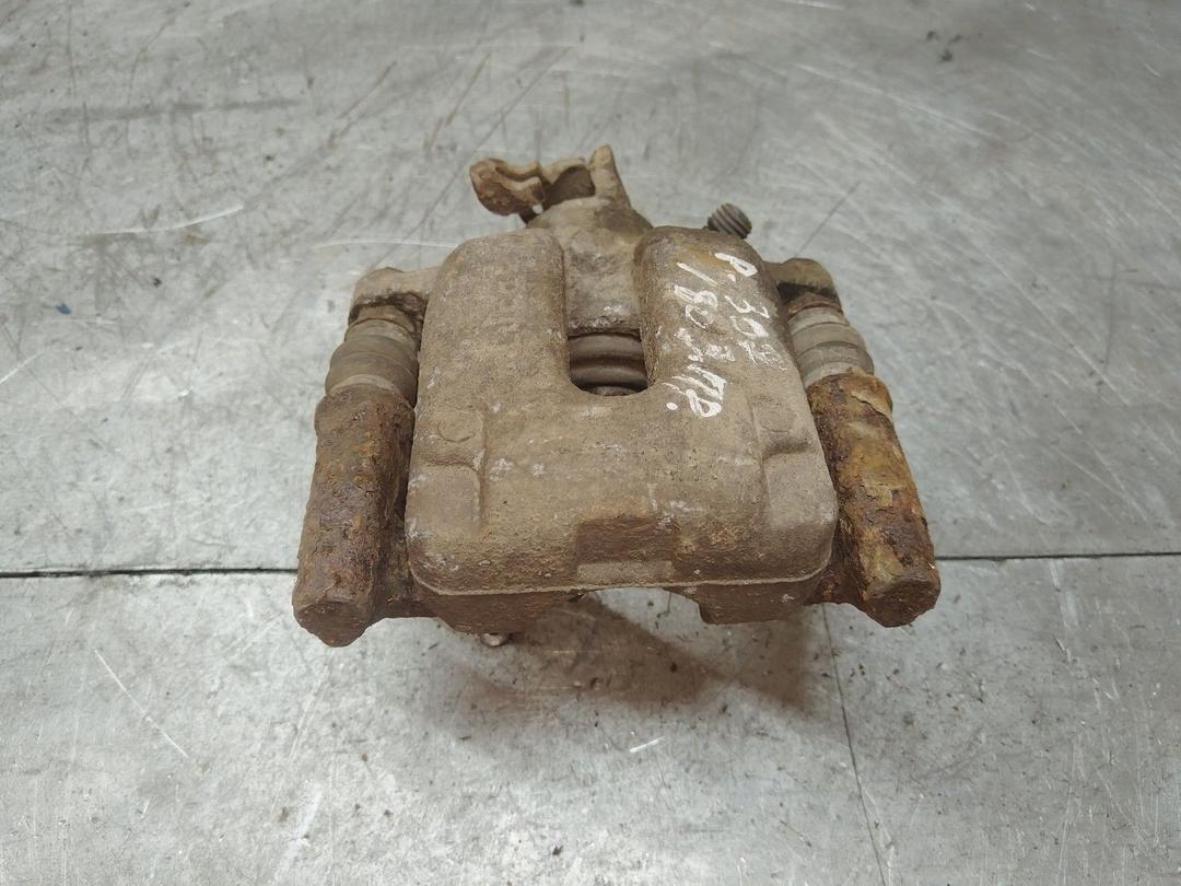 Суппорт задний правый O0F8ZR Peugeot 307