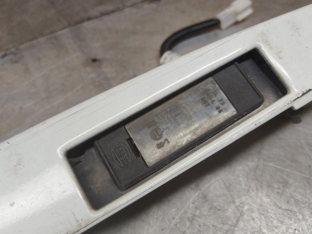 Накладка подсветки номера V1TQGT Nissan Note - Фото 4