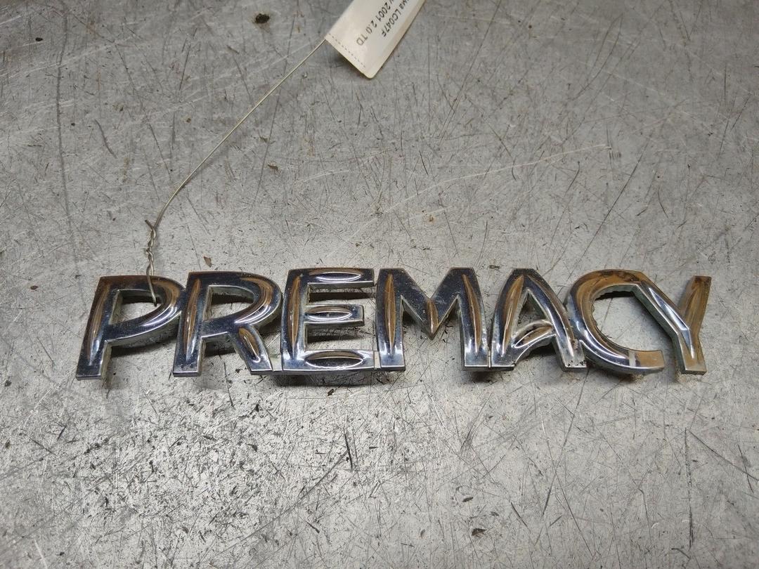 Эмблема LC047F Mazda Premacy - Фото 1