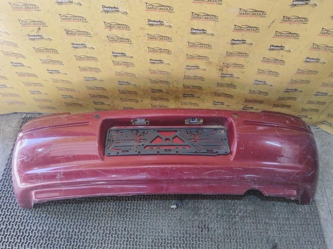 Бампер задний FL7YW5 Kia Shuma