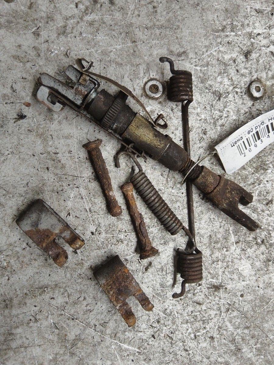 Механизм развода задних тормозных колодок правый D1V9JP Nissan Micra - Фото 1