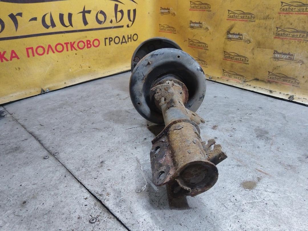 Амортизатор передний левый I4AMEH Renault Laguna купить в магазине запчастей бу