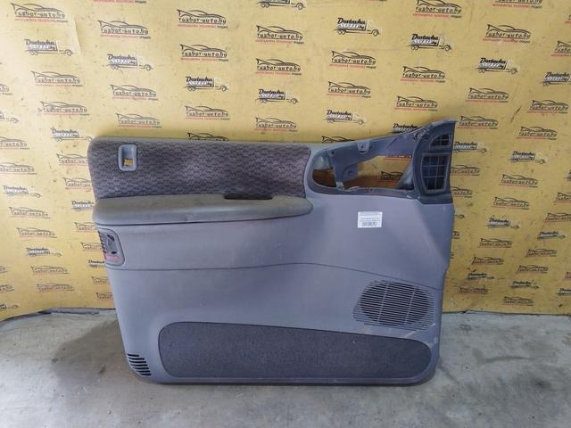 Обшивка двери передней левой (дверная карта) QYV73Y Chrysler Voyager купить