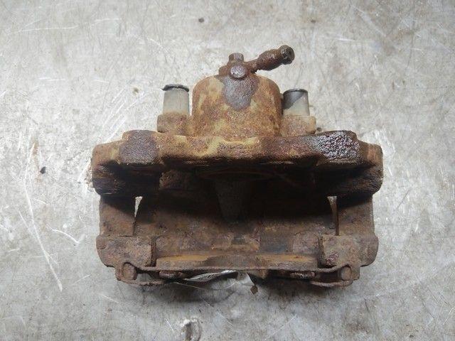 Суппорт передний правый Q2J4FM Opel Astra купить на авторазборке