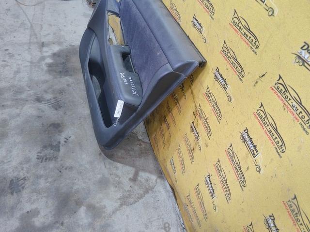 Обшивка двери передней правой (дверная карта) PS0D82 Toyota Corolla купить в магазине запчастей бу