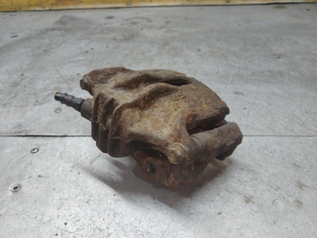 Суппорт передний левый MNTE7O Citroen Xsara Picasso купить в магазине запчастей бу