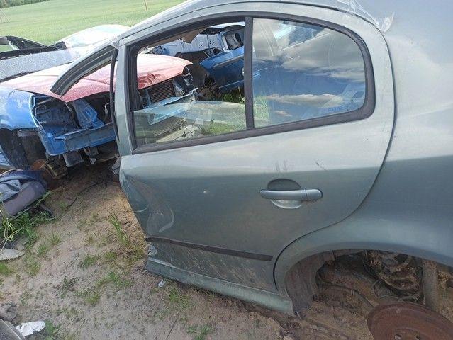 Уплотнитель двери задней левой 93ULUC Skoda Octavia купить