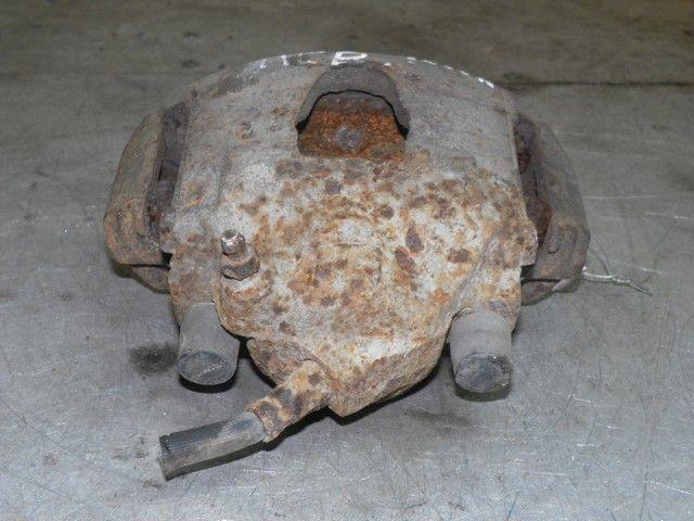 Суппорт передний левый JX25YL Mazda 323F - Фото 2