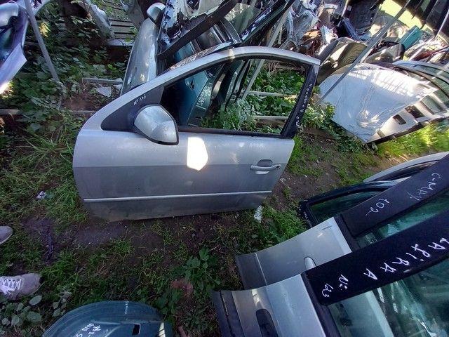 Обшивка двери передней левой (дверная карта) D38I1Z Ford Mondeo купить