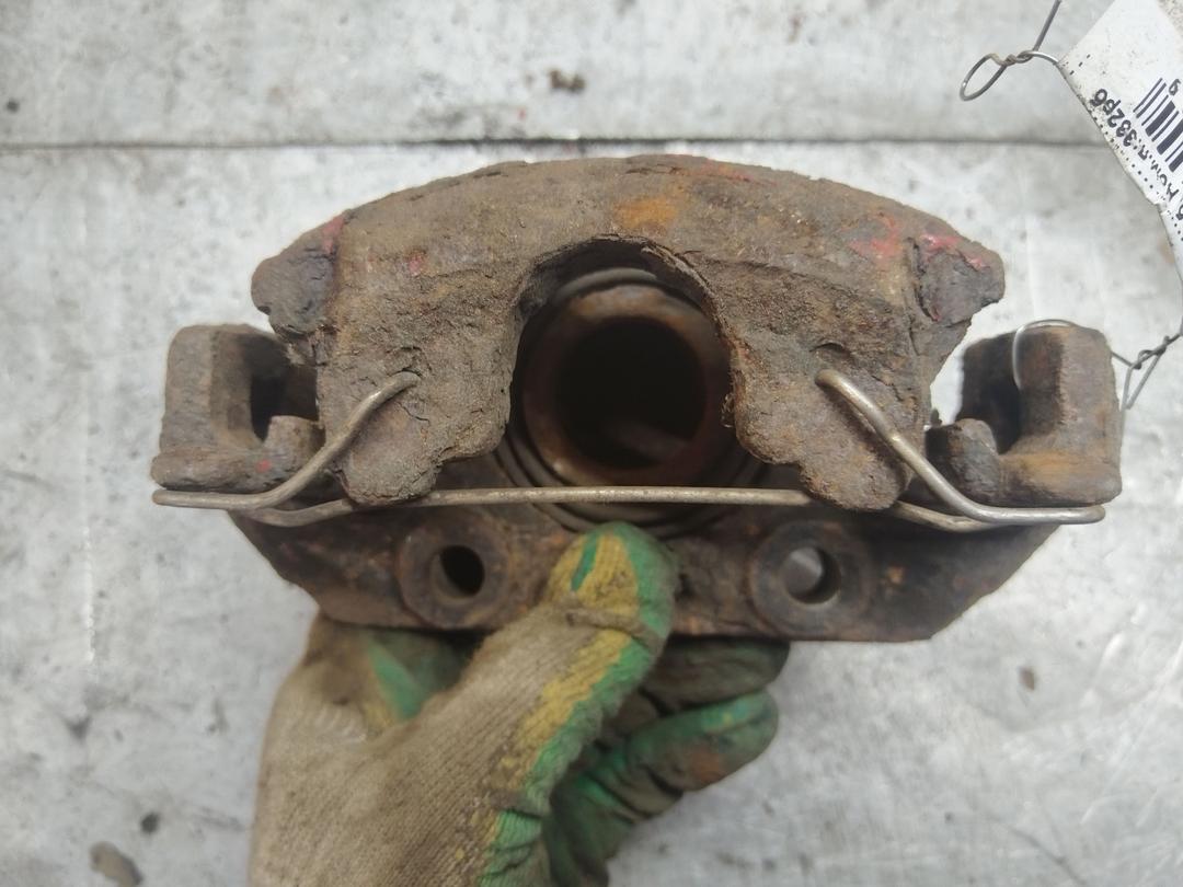 Суппорт передний левый 1P8K7F Opel Astra купить в магазине запчастей бу