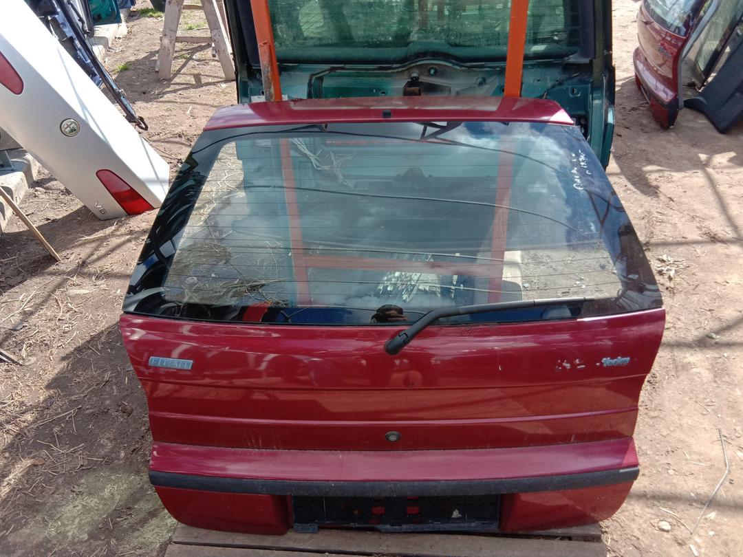Стекло заднее 55TMJ6 Fiat Palio