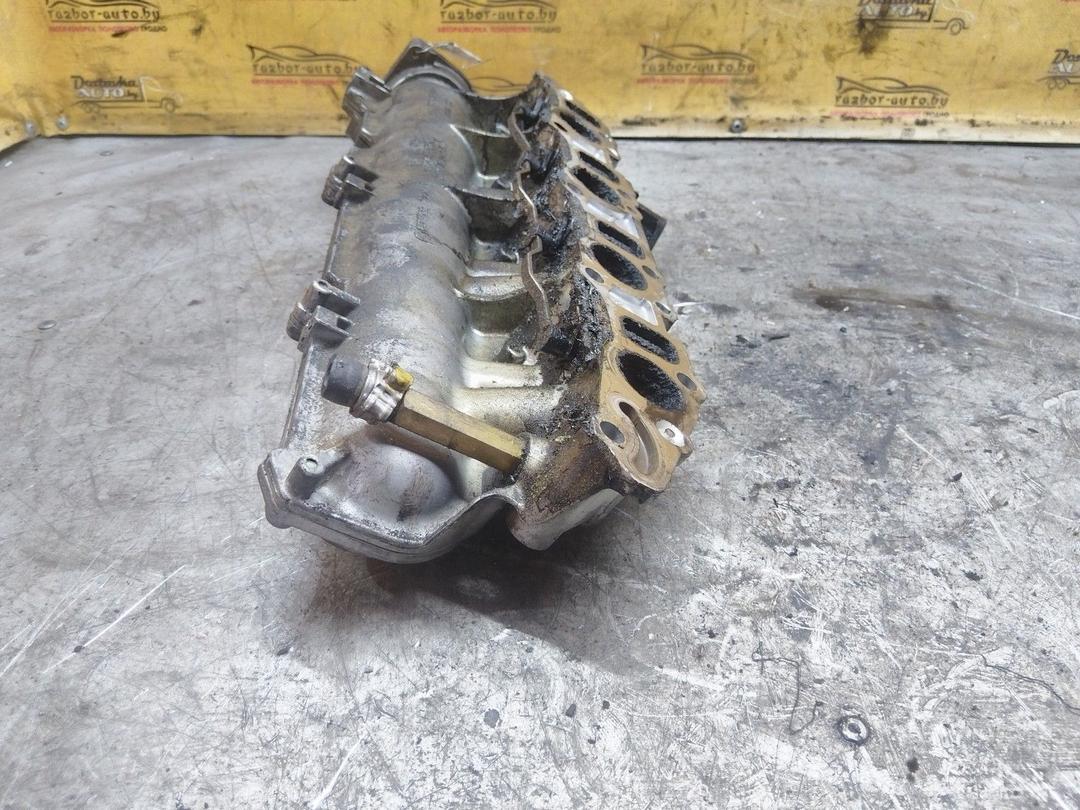 Коллектор впускной 6P1U35 Opel Zafira купить в магазине запчастей бу