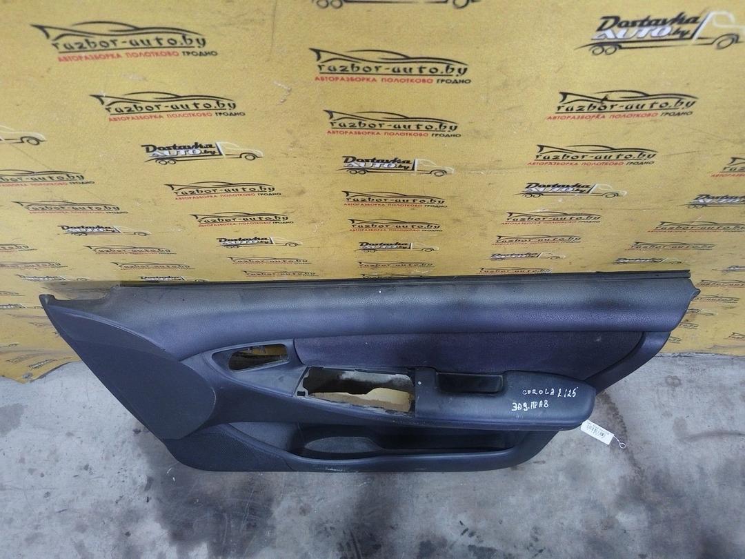 Обшивка двери передней правой (дверная карта) PS0D82 Toyota Corolla купить