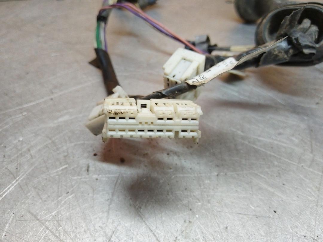 Проводка двери передней левой 6TSK3Y Nissan Note купить в магазине запчастей бу