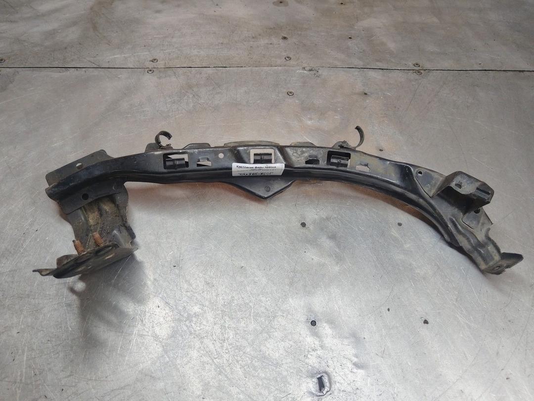 Крепление фары правой QOL16L Subaru Impreza