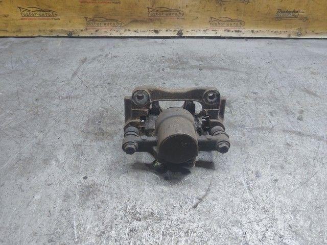 Суппорт задний левый 48Z5UK Toyota Corolla Verso купить на авторазборке