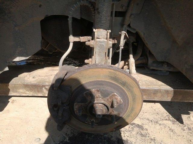 Суппорт передний левый PGHU6E Chrysler Voyager купить