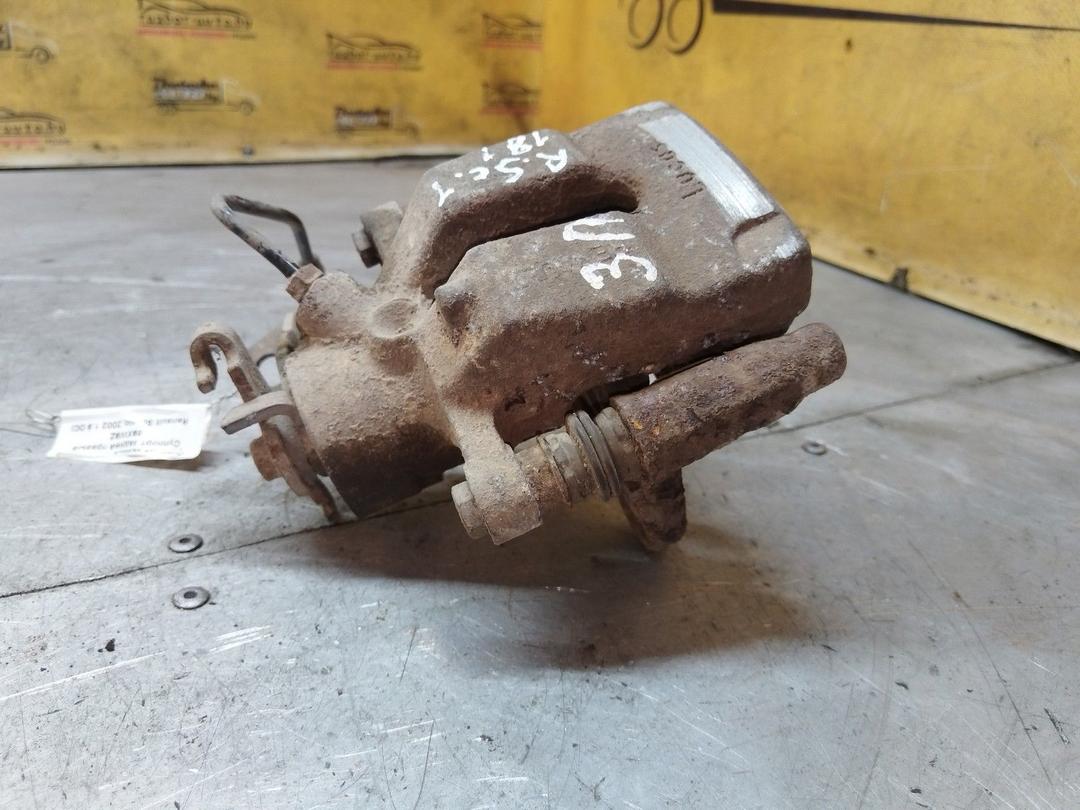 Суппорт задний правый 89XW9Z Renault Scenic купить в магазине запчастей бу