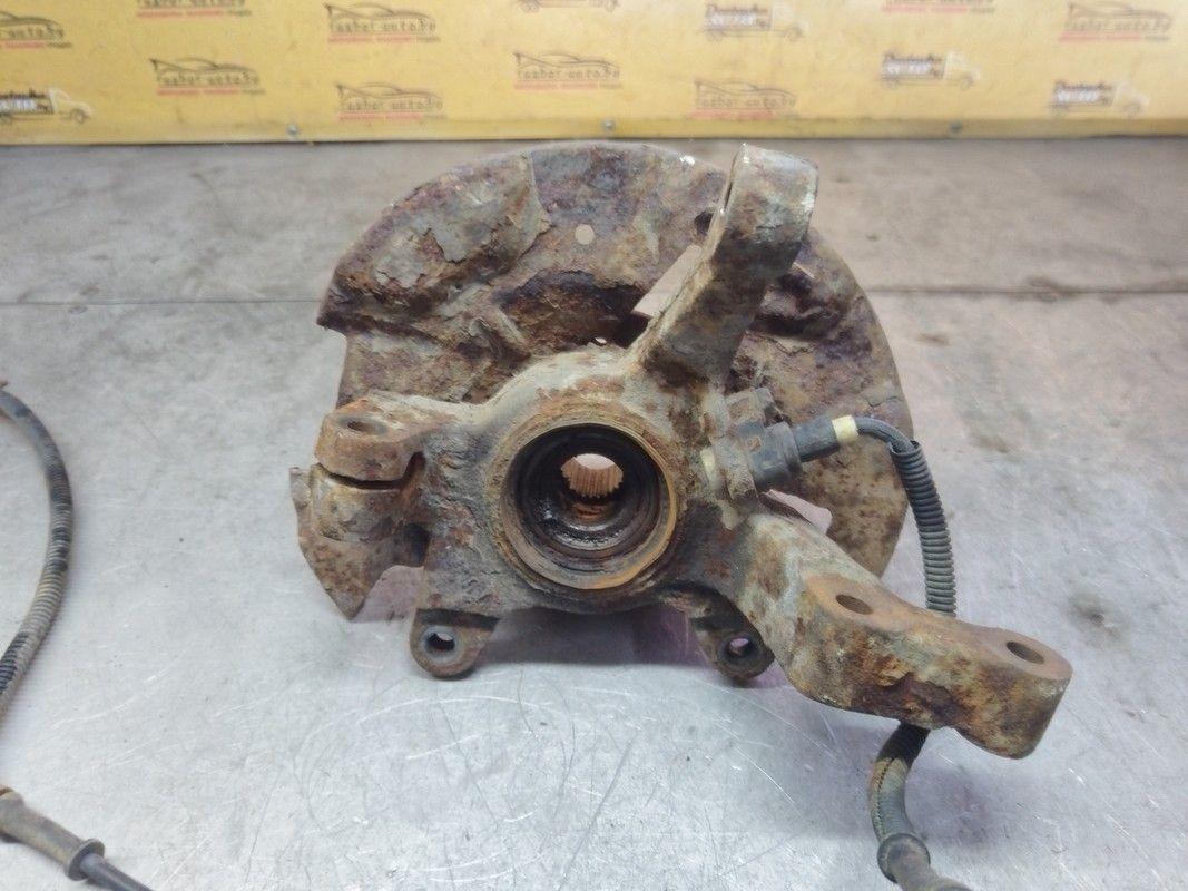 Кулак поворотный левый 3C6GG3 Kia Shuma купить