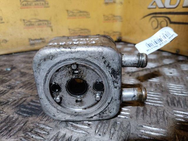 Теплообменник масляного фильтра 0IORWM Ford Galaxy купить в магазине запчастей бу