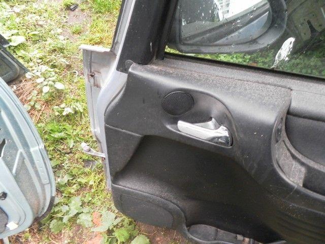 Ограничитель открывания двери передней SK2UUI Opel Zafira