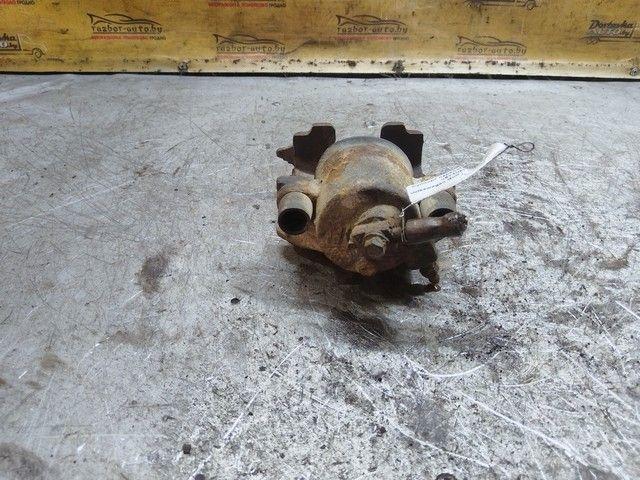 Суппорт передний левый V8Y4HK Volkswagen Golf купить на авторазборке