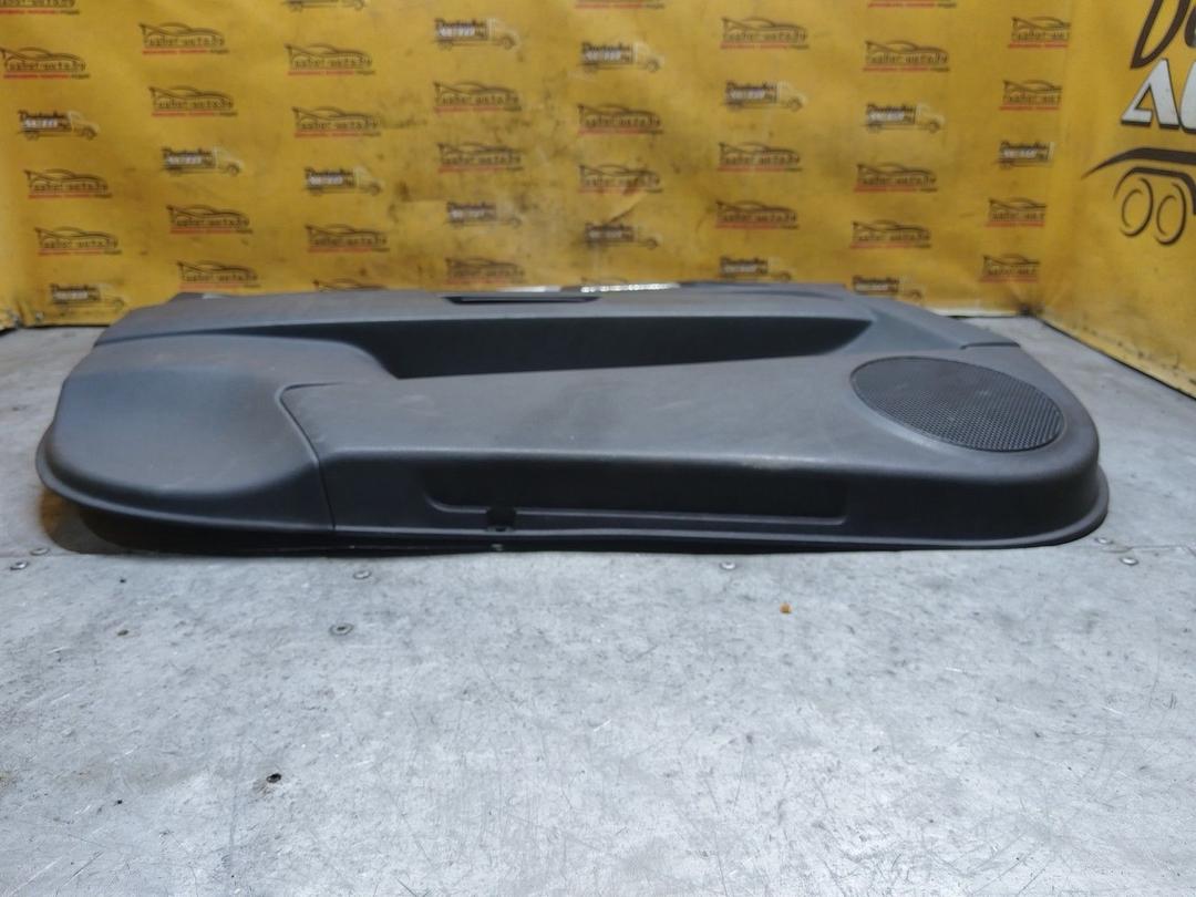 Обшивка двери передней левой (дверная карта) 1L118D Opel Zafira купить на авторазборке