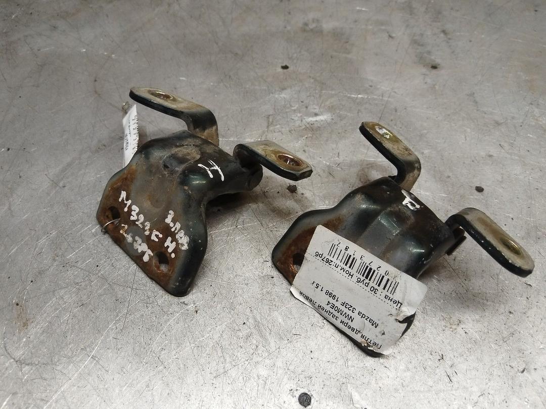 Петля двери задней левой NWM0E4 Mazda 323F