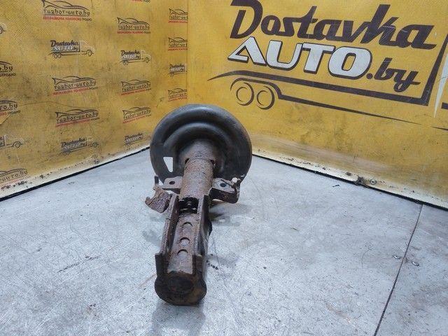 Амортизатор передний левый M4O6E1 Renault Scenic купить в магазине запчастей бу